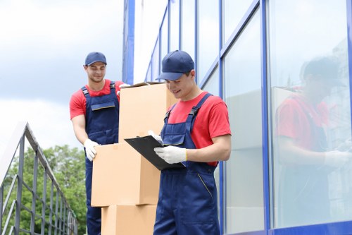 Removal van and moving boxes near Hammersmith residential streets