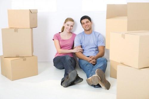 Prepared moving boxes and furniture in a Hammersmith property