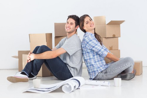 Unpacking household items in a Hammersmith apartment after moving