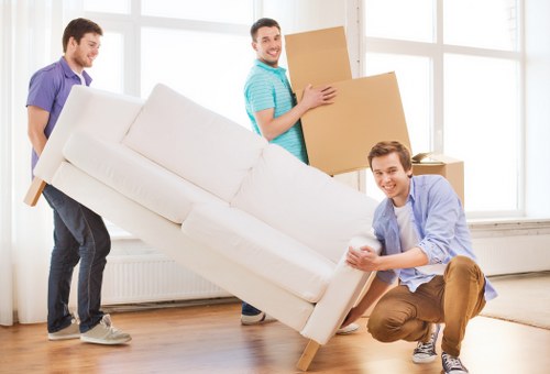 Professional removal crew organizing belongings during a Hammersmith relocation