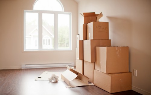 House movers preparing a move in Hammersmith with boxes and furniture