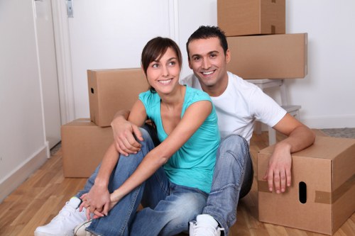 Local moving team handling packing tasks in a West London property