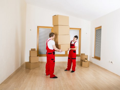 A professional removals team managing bulky items in Hammersmith